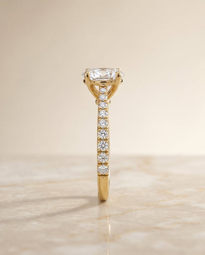 Donna Select Cathedral French Pavé Solitaire Oval Lab Diamond Engagement Ring in 18K Yellow Gold, side view | RockHer