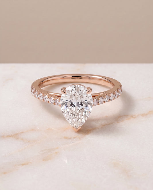 The Donna Cathedral French Pavé Solitaire Pear Engagement Ring Setting in 14K Rose Gold