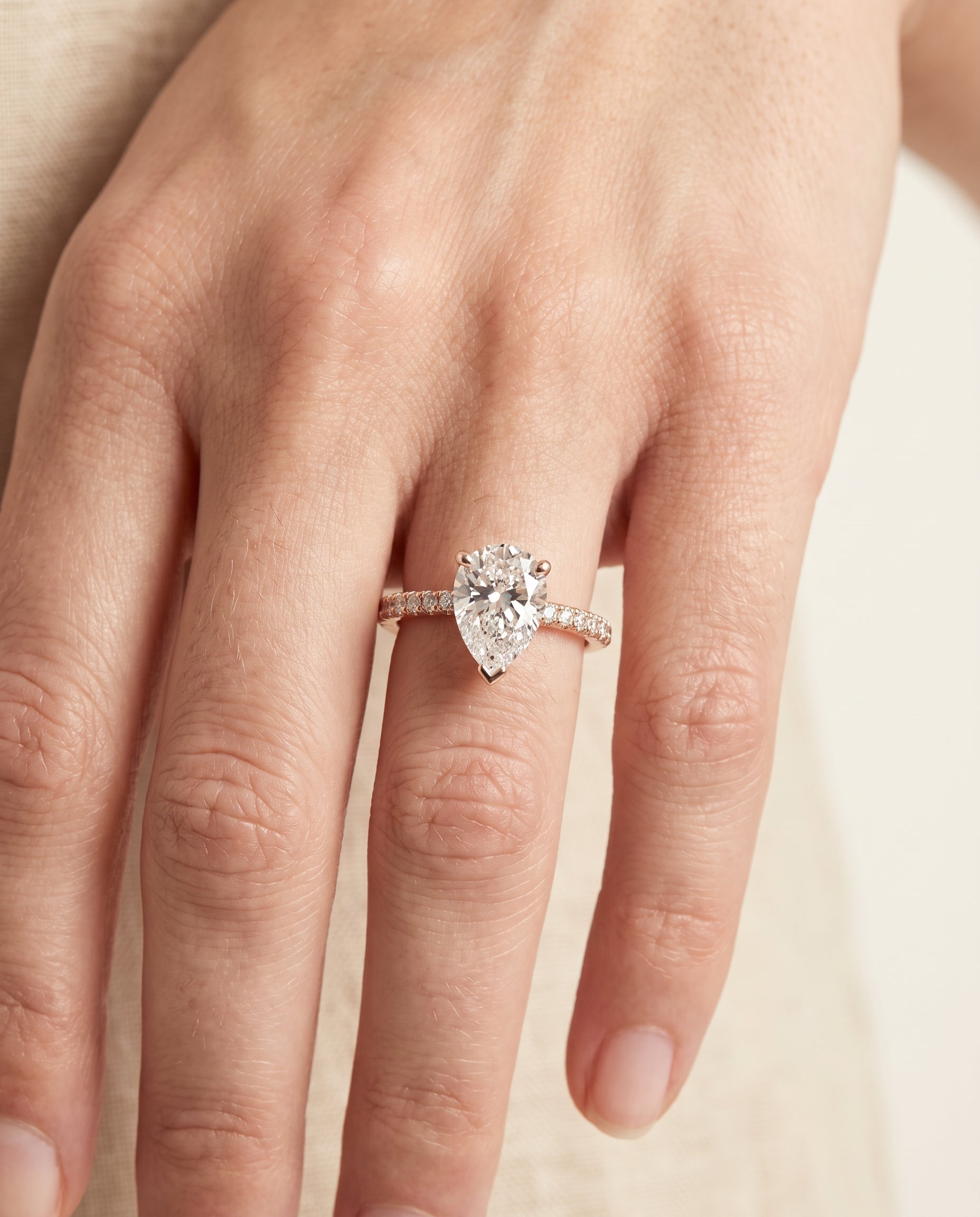 The Donna engagement ring setting in 14K Rose Gold, cathedral french pavé solitaire design | RockHer