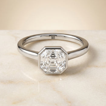 The Duran Simple Bezel Solitaire Asscher Cut Engagement Ring Setting in 18K White Gold