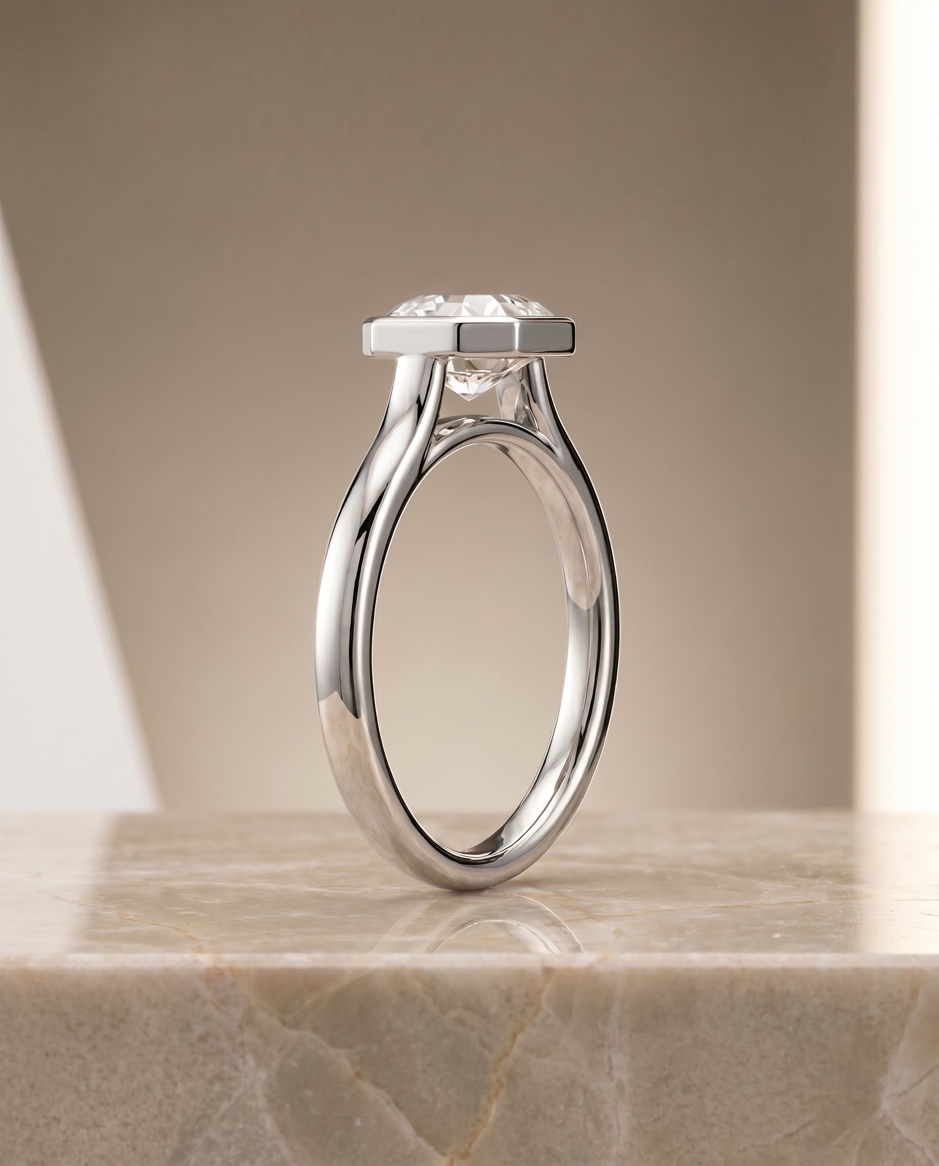 Simple Bezel Solitaire Cut styling on The Duran asscher engagement ring setting | RockHer