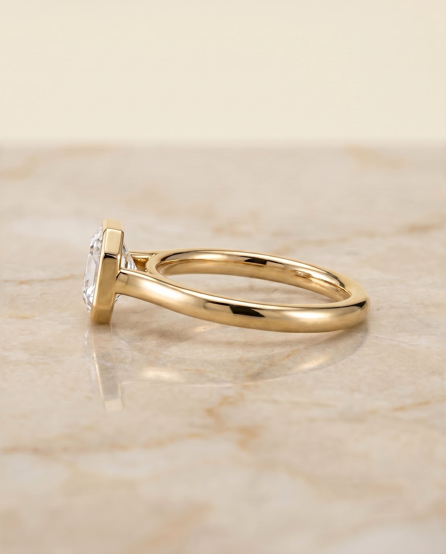 The Duran Bezel Solitaire Engagement Ring Setting for Asscher Diamonds in 18K Yellow Gold
