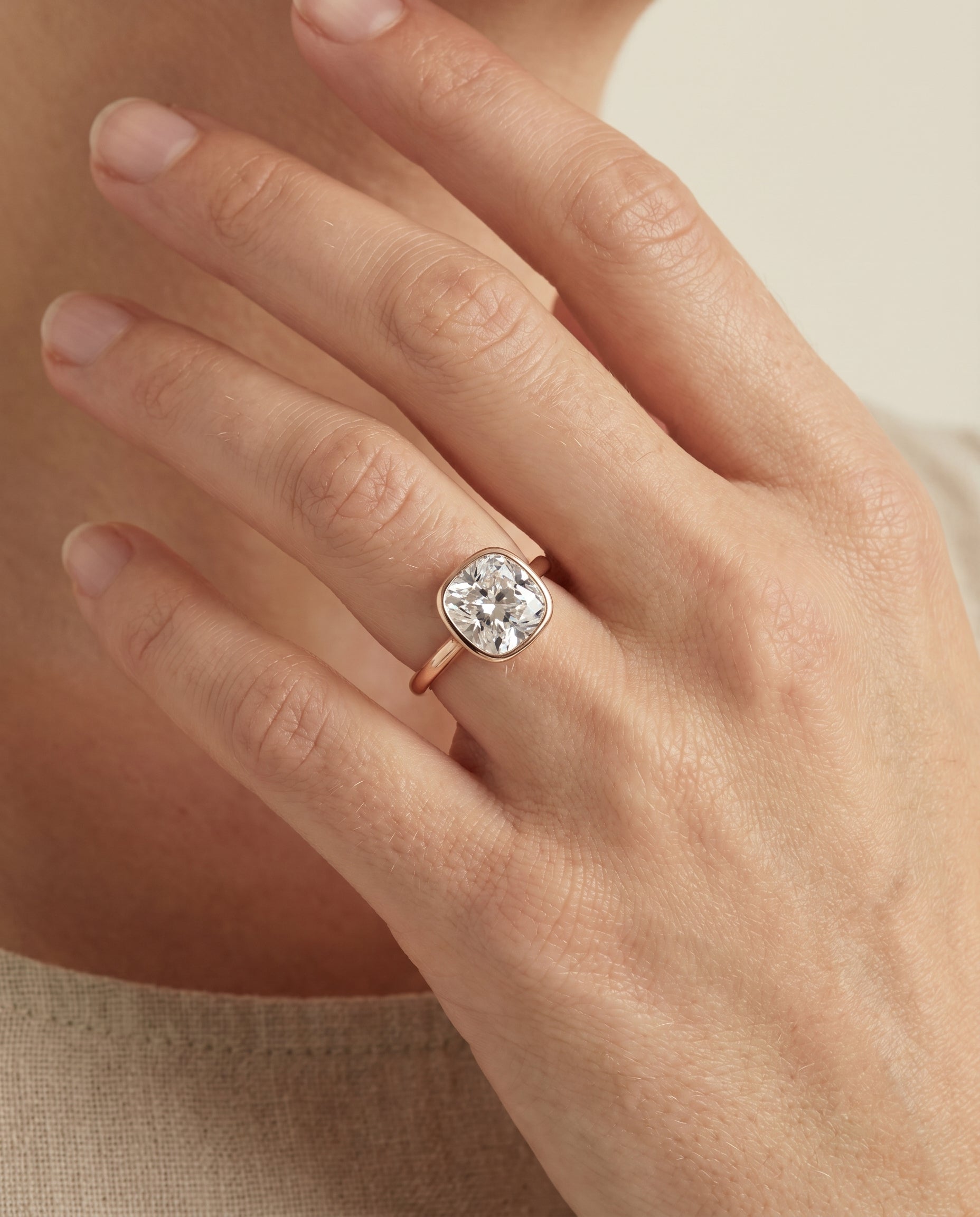 The Duran engagement ring setting in 14K Rose Gold, simple bezel solitaire cut design | RockHer