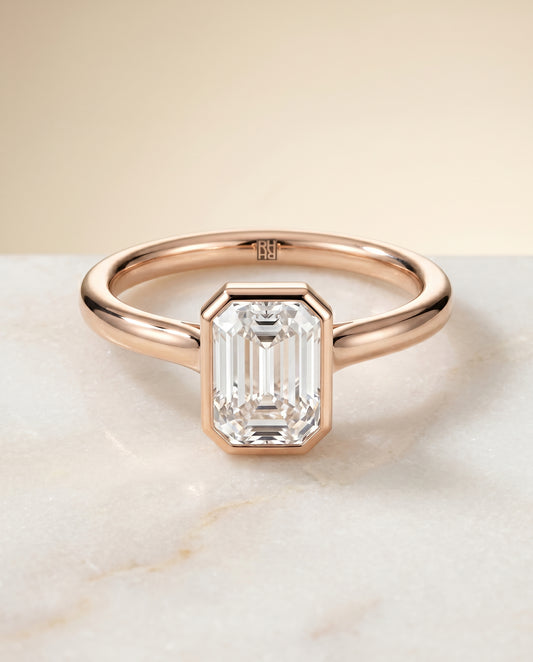 The Duran Bezel Solitaire Engagement Ring Setting for Emerald Cut Diamonds in 14K Rose Gold