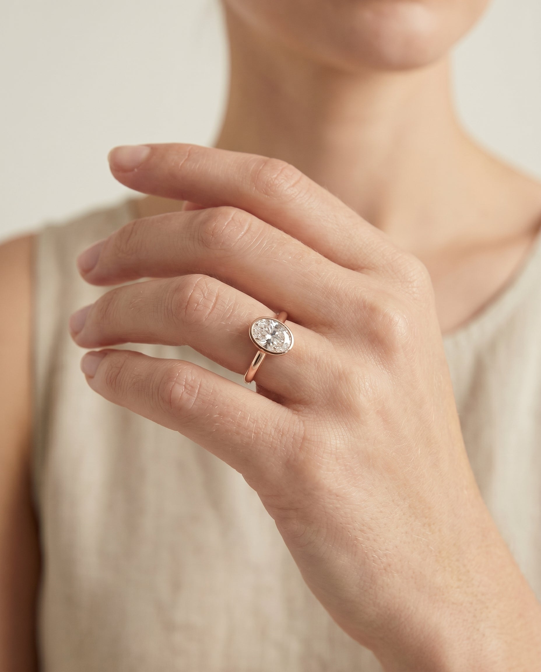 The Duran engagement ring setting in 14K Rose Gold, simple bezel solitaire design | RockHer