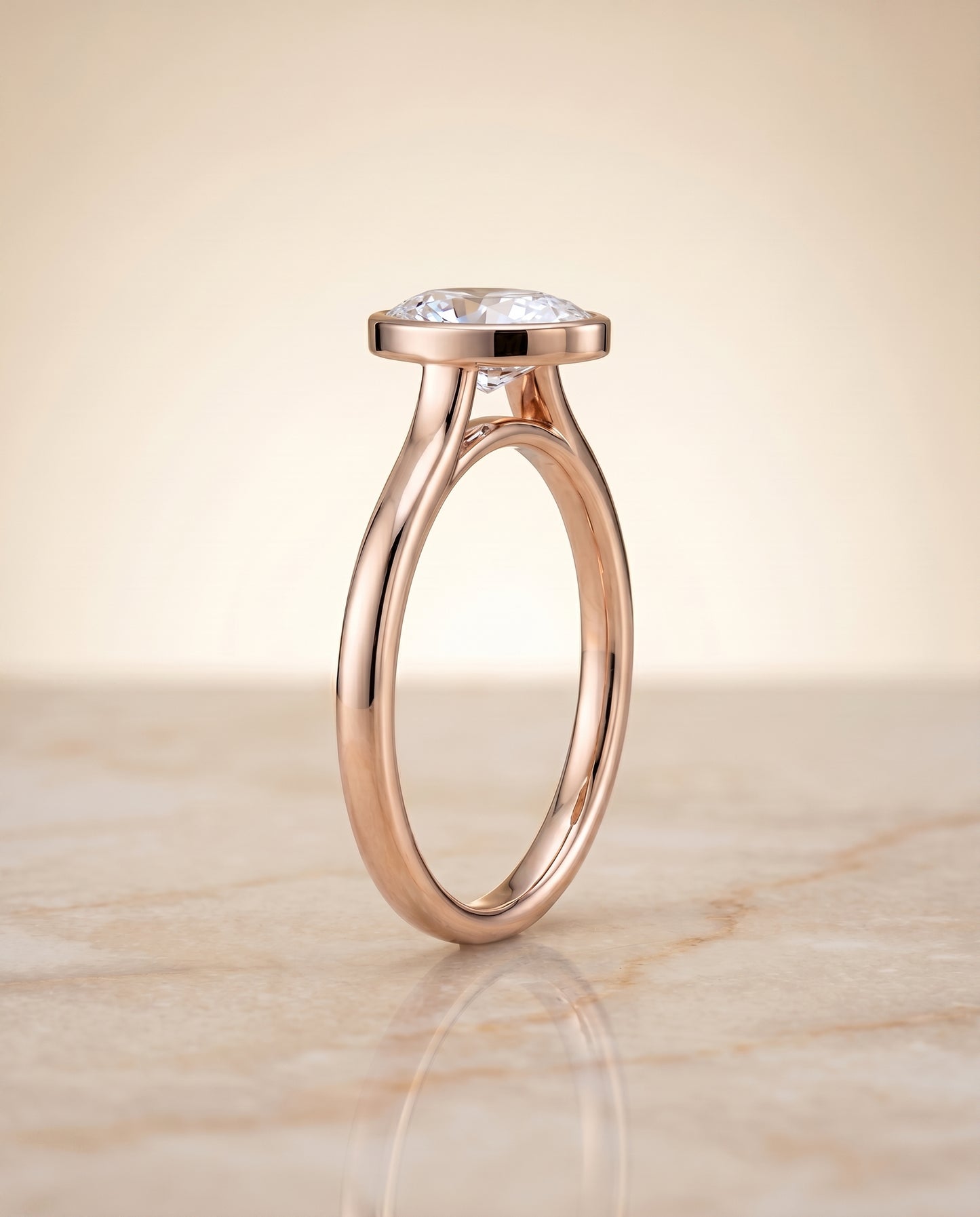 The Duran Simple Bezel Solitaire Engagement Ring Setting for Oval Diamonds in 14K Rose Gold
