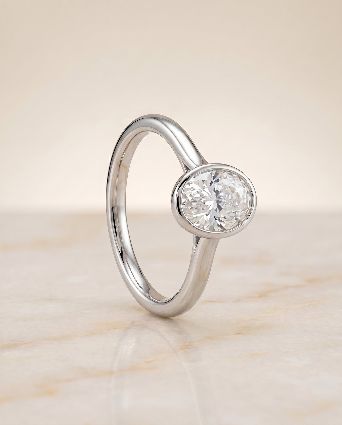 Duran Select Simple Bezel Solitaire Oval Lab Diamond Engagement Ring in Platinum, front view | RockHer