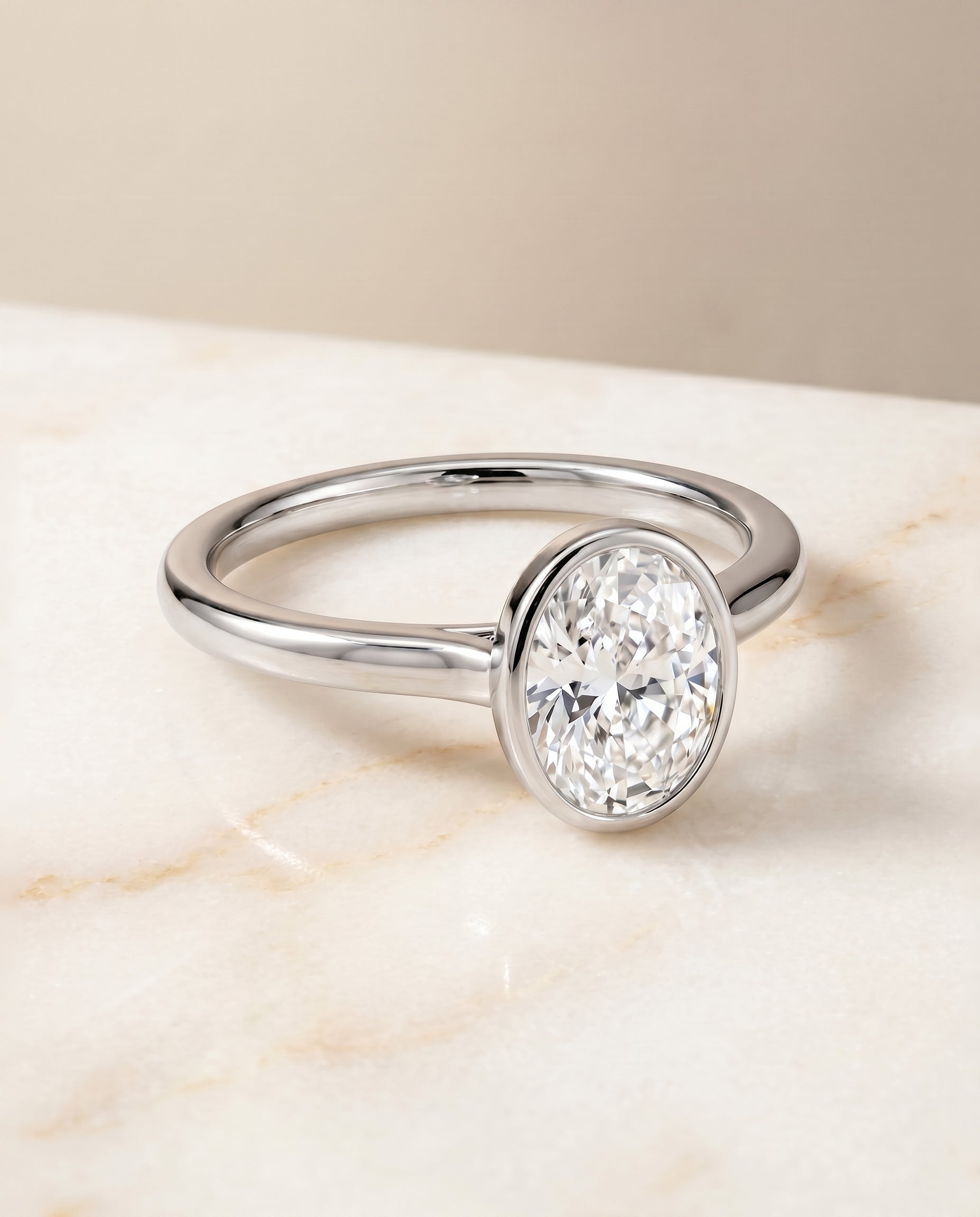 The Duran Select Simple Bezel Solitaire Engagement Ring with Lab Diamond in Platinum - view 1