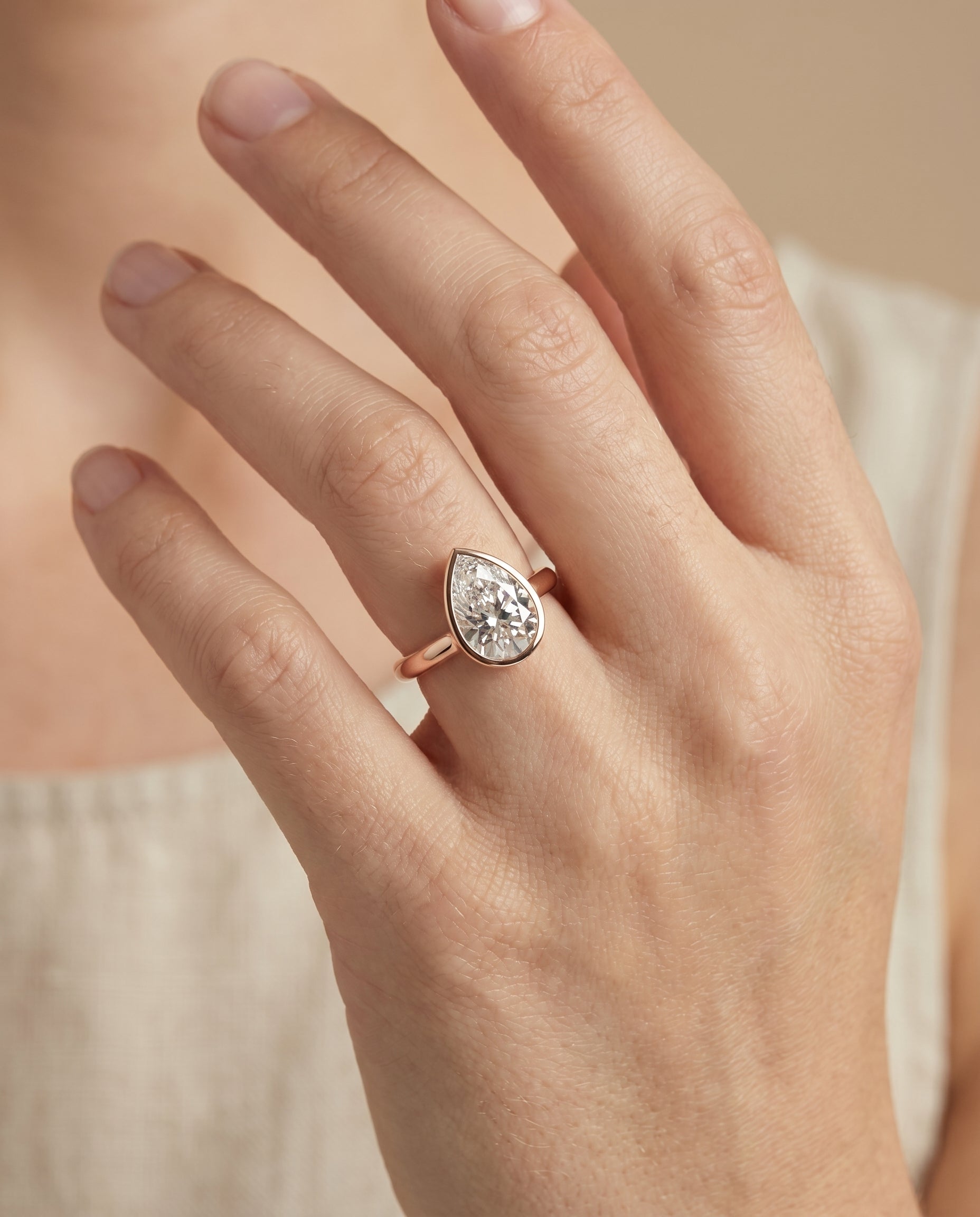 The Duran engagement ring setting in 14K Rose Gold, simple bezel solitaire design | RockHer