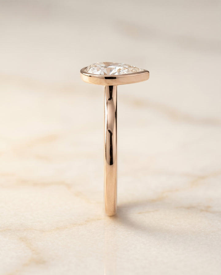 The Duran Bezel Solitaire Engagement Ring Setting for Pear Diamonds in 14K Rose Gold