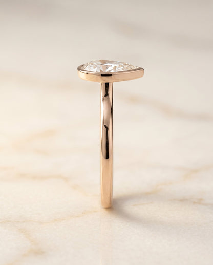 Duran Select Simple Bezel Solitaire Pear Lab Diamond Engagement Ring in 14K Rose Gold, side view | RockHer