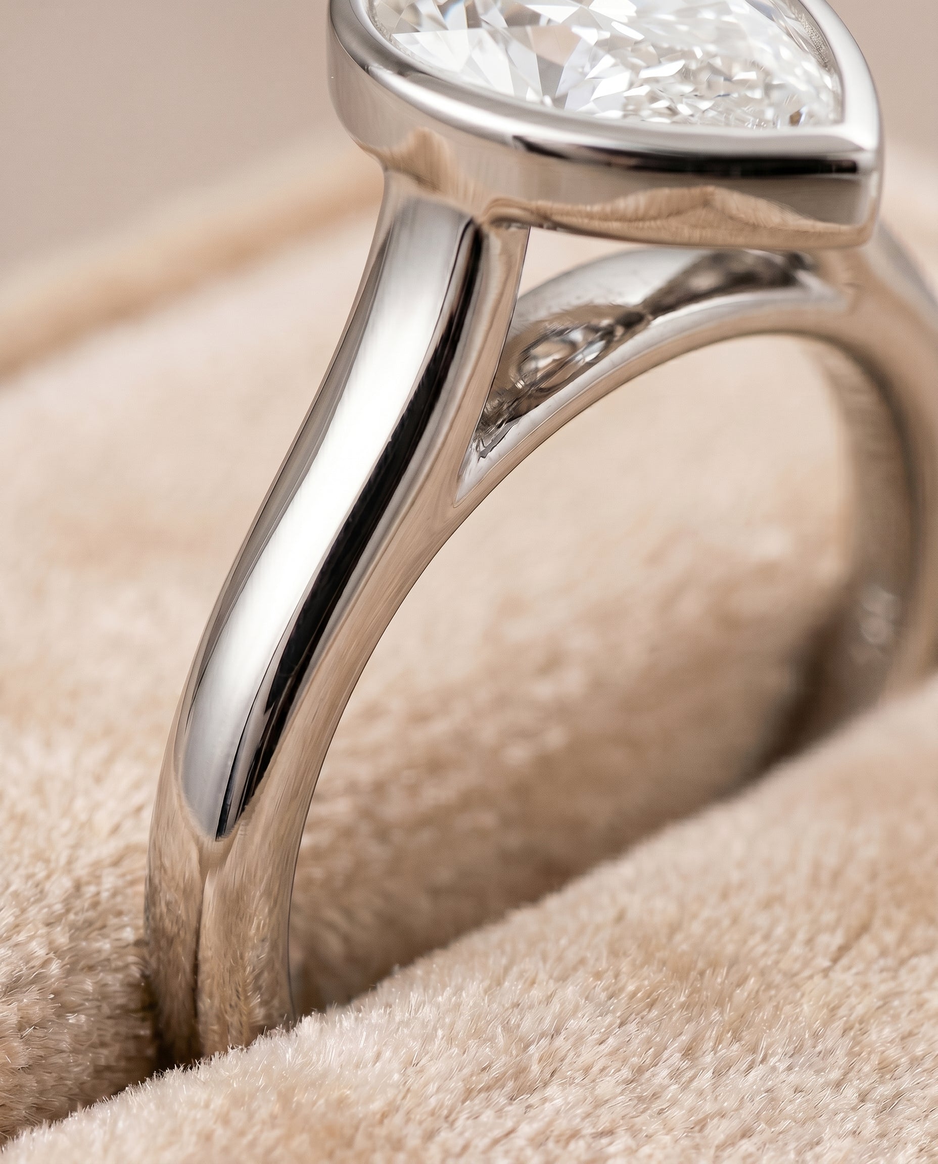 Duran Select Simple Bezel Solitaire Pear Lab Diamond Engagement Ring in Platinum, detail view | RockHer