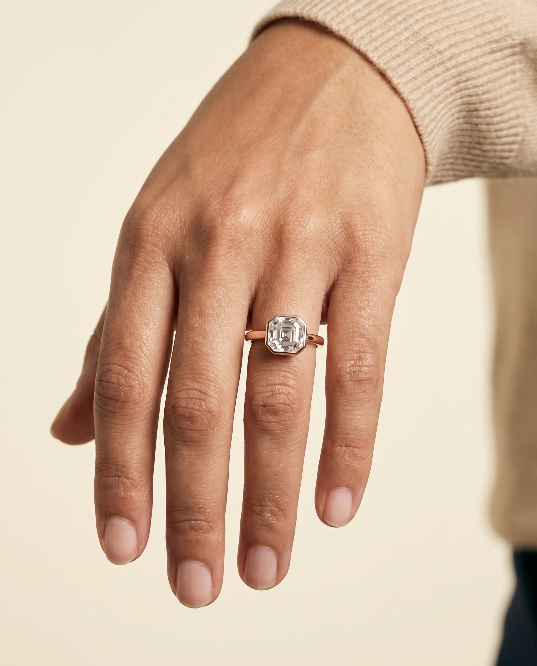The Duran engagement ring setting in 14K Rose Gold, simple bezel solitaire cut design | RockHer