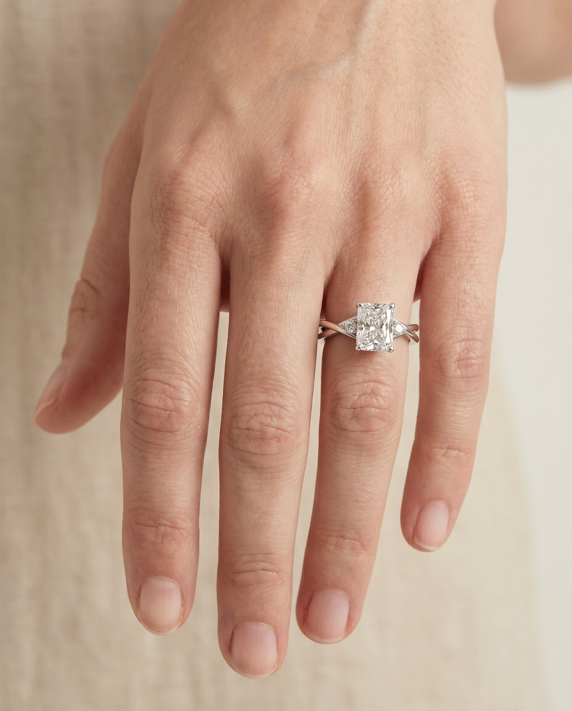 The Dusty engagement ring setting in Platinum, hidden halo solitaire cut design | RockHer