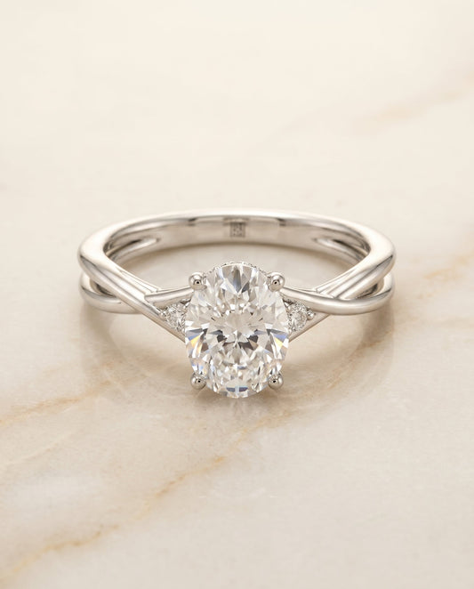 Dusty Select Twisted Shank Hidden Halo Solitaire Oval in 18K White Gold – view 1
