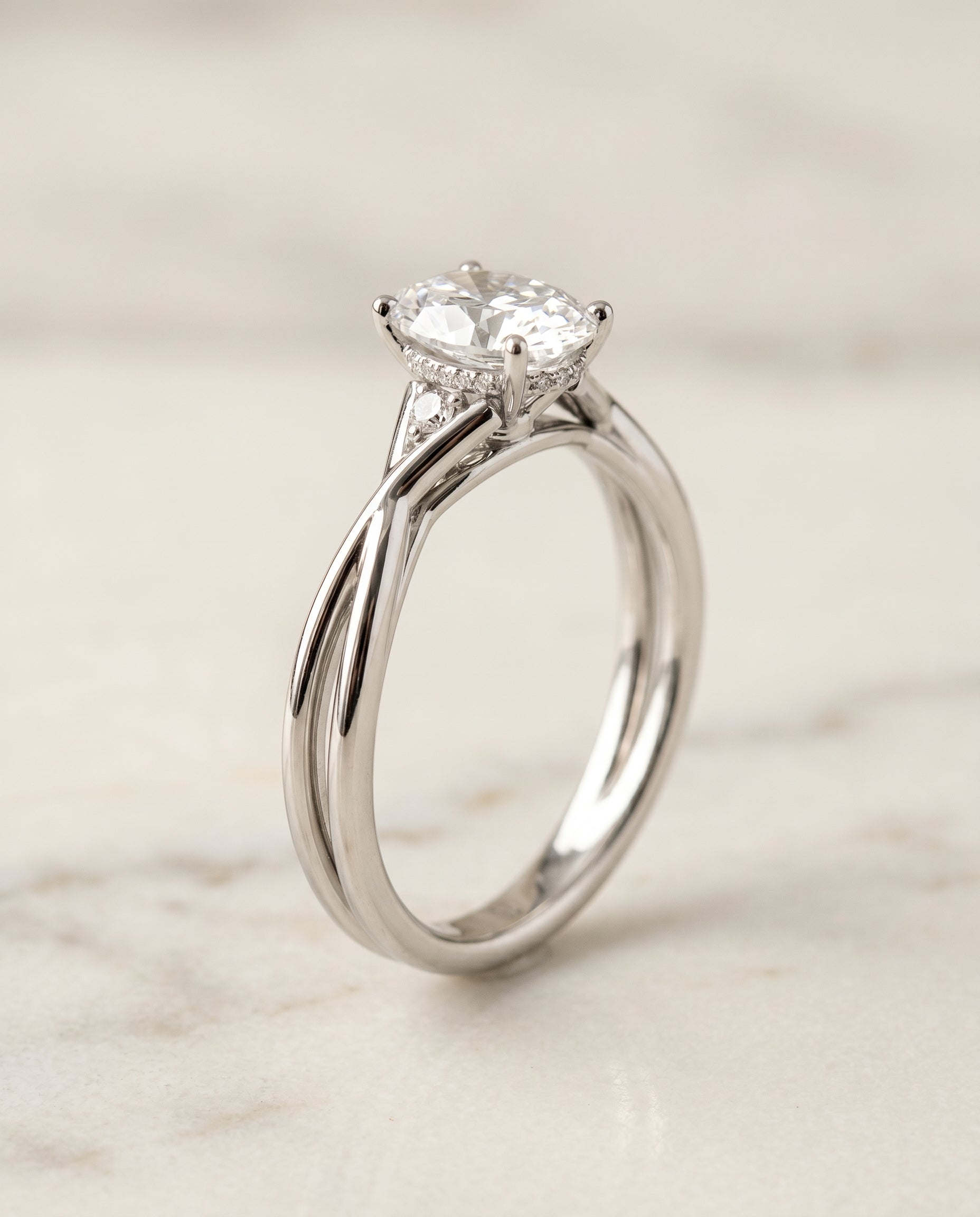 Hidden Halo Solitaire styling on The Dusty oval engagement ring setting | RockHer