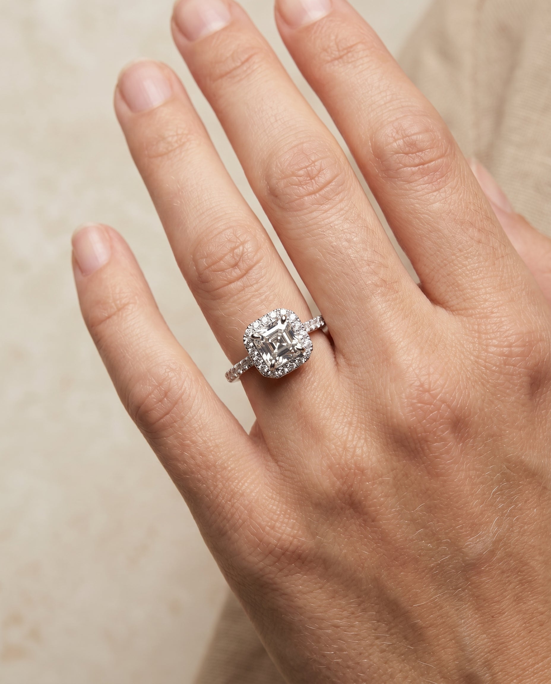 The Dylan engagement ring setting in Platinum, petite french pavé halo cut design | RockHer