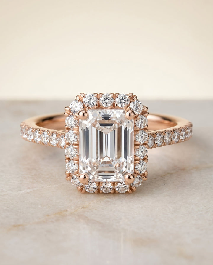 Dylan Select Halo Emerald Cut Lab Diamond Engagement Ring in 14K Rose Gold, shown on hand, angled | RockHer