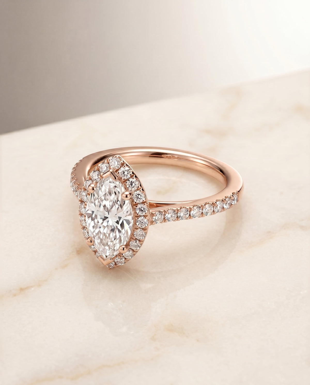 Dylan Select Halo Marquise Lab Diamond Engagement Ring in 14K Rose Gold, shown on hand, angled | RockHer