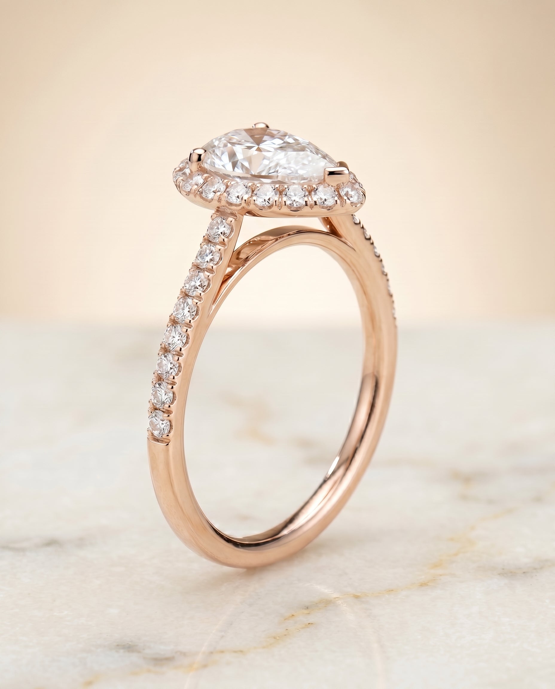 Petite French Pavé Halo styling on The Dylan pear engagement ring setting | RockHer
