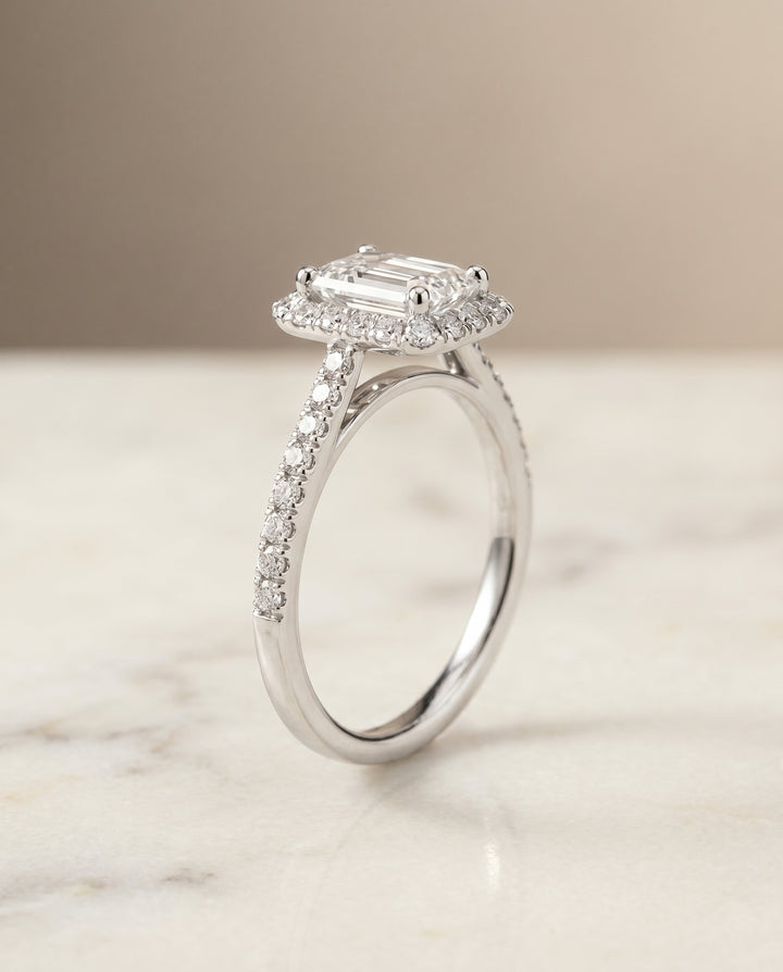The Dylan Pavé Halo Engagement Ring Setting for Emerald Cut Diamonds in 18K White Gold
