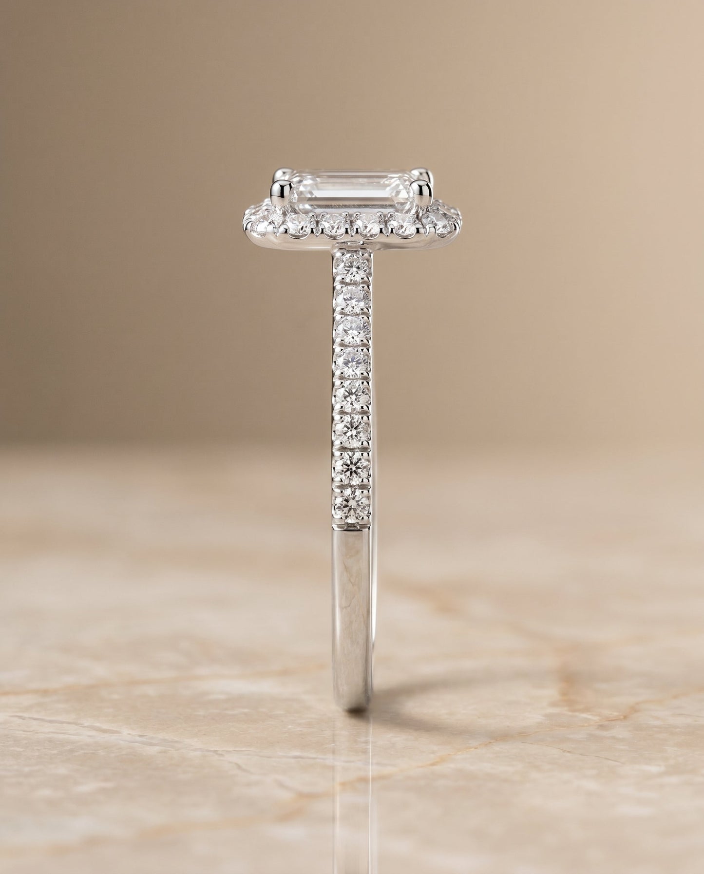 Dylan Select Petite French Pavé Halo Emerald Cut Lab Diamond Engagement Ring in Platinum, side view | RockHer
