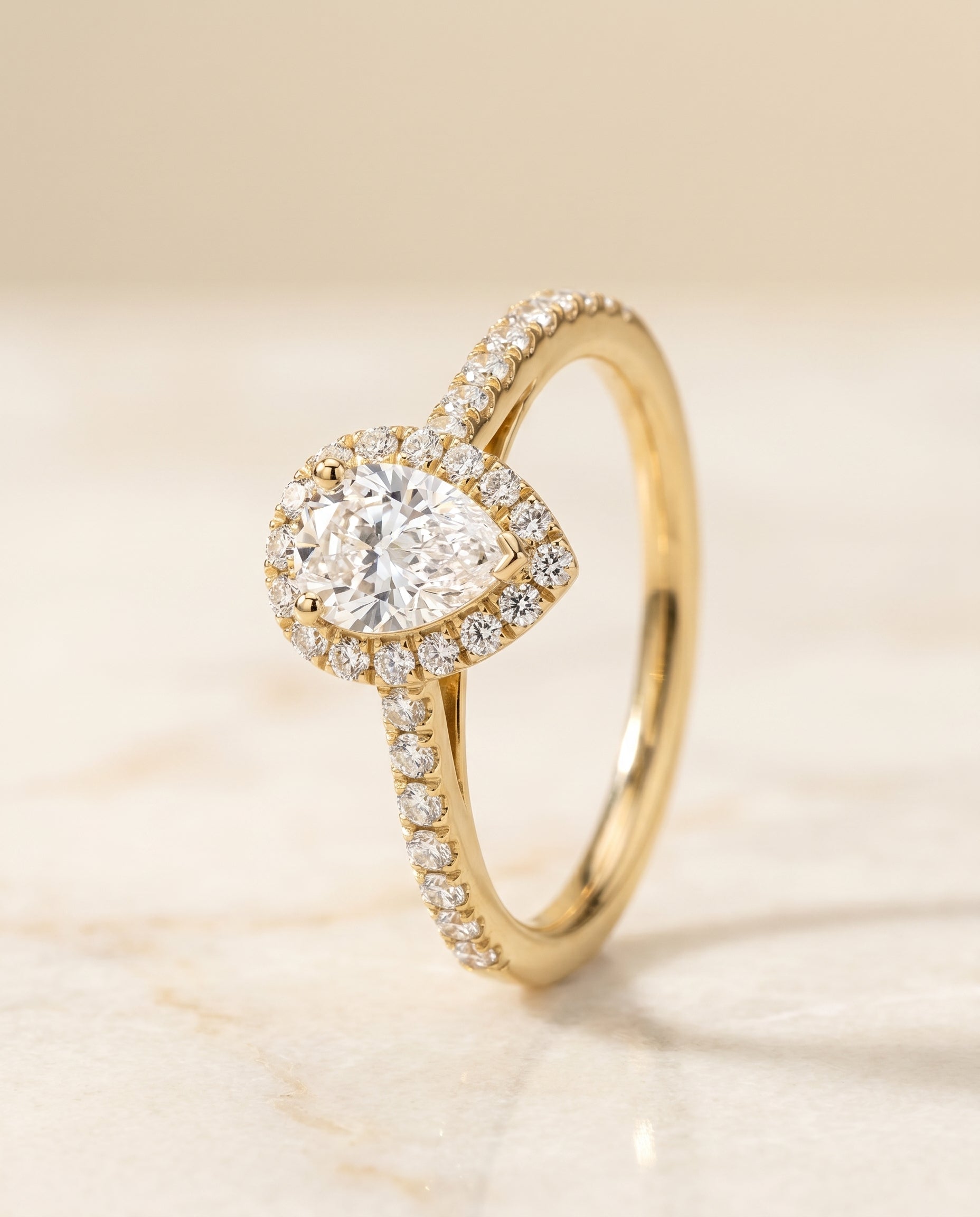 Petite French Pavé Halo styling on The Dylan pear engagement ring setting | RockHer