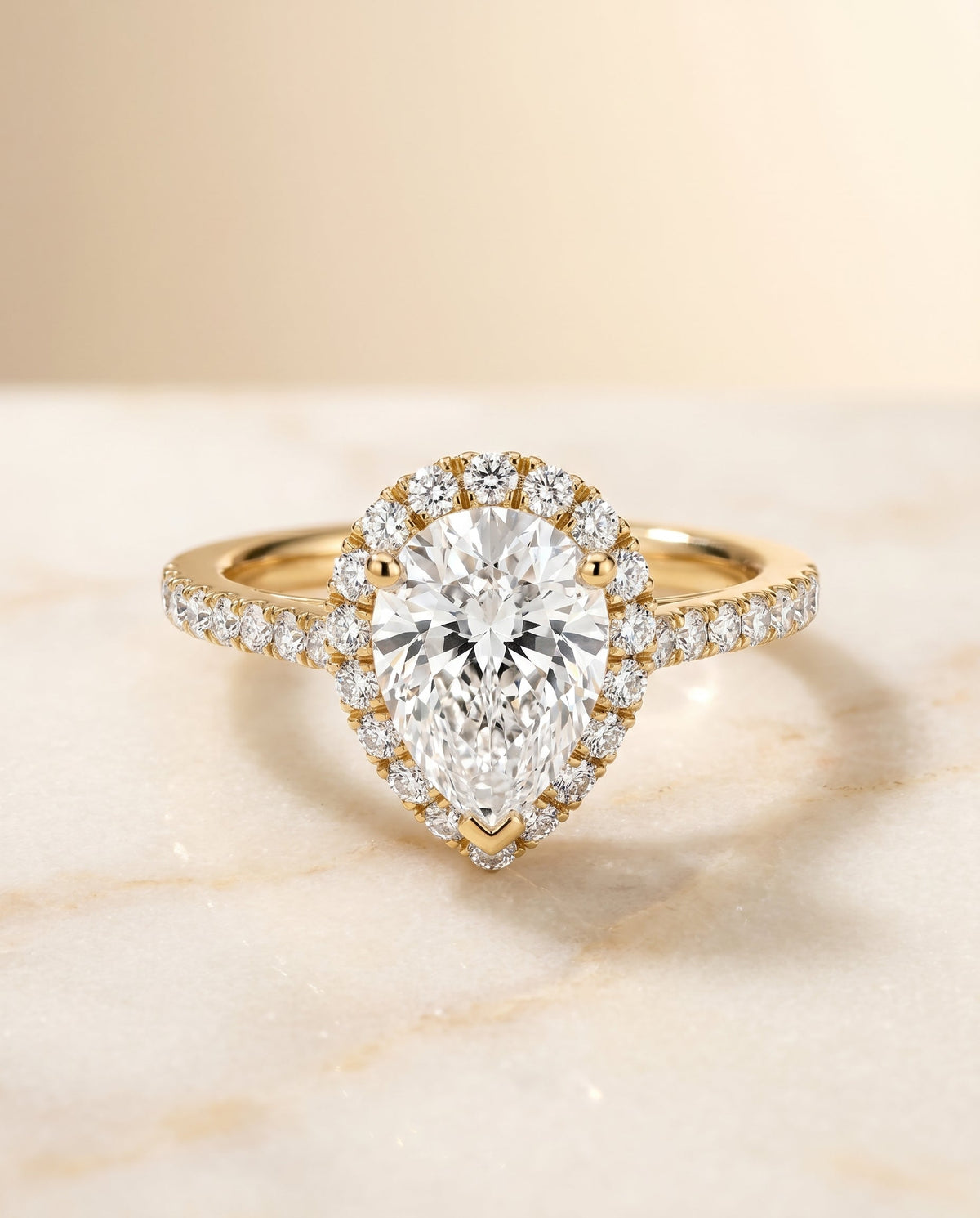 Dylan Select Halo Pear Lab Diamond Engagement Ring in 18K Yellow Gold, shown on hand, angled | RockHer