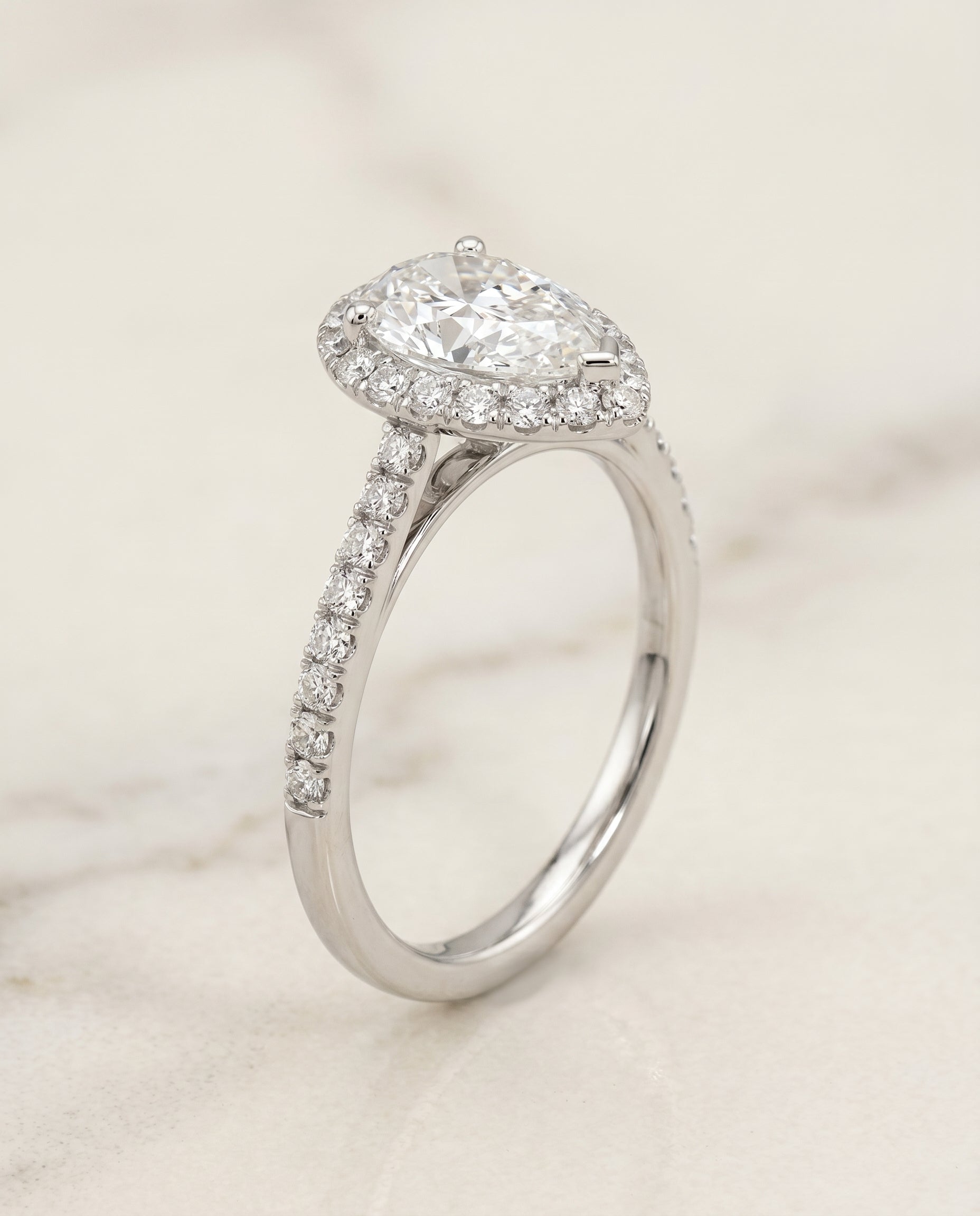 Petite French Pavé Halo styling on The Dylan pear engagement ring setting | RockHer