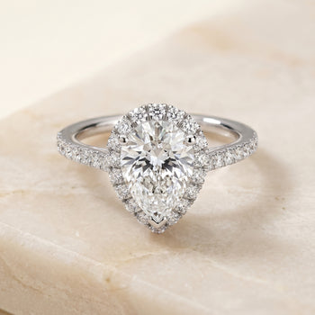 The Dylan Petite French Pavé Halo Pear Engagement Ring Setting in Platinum
