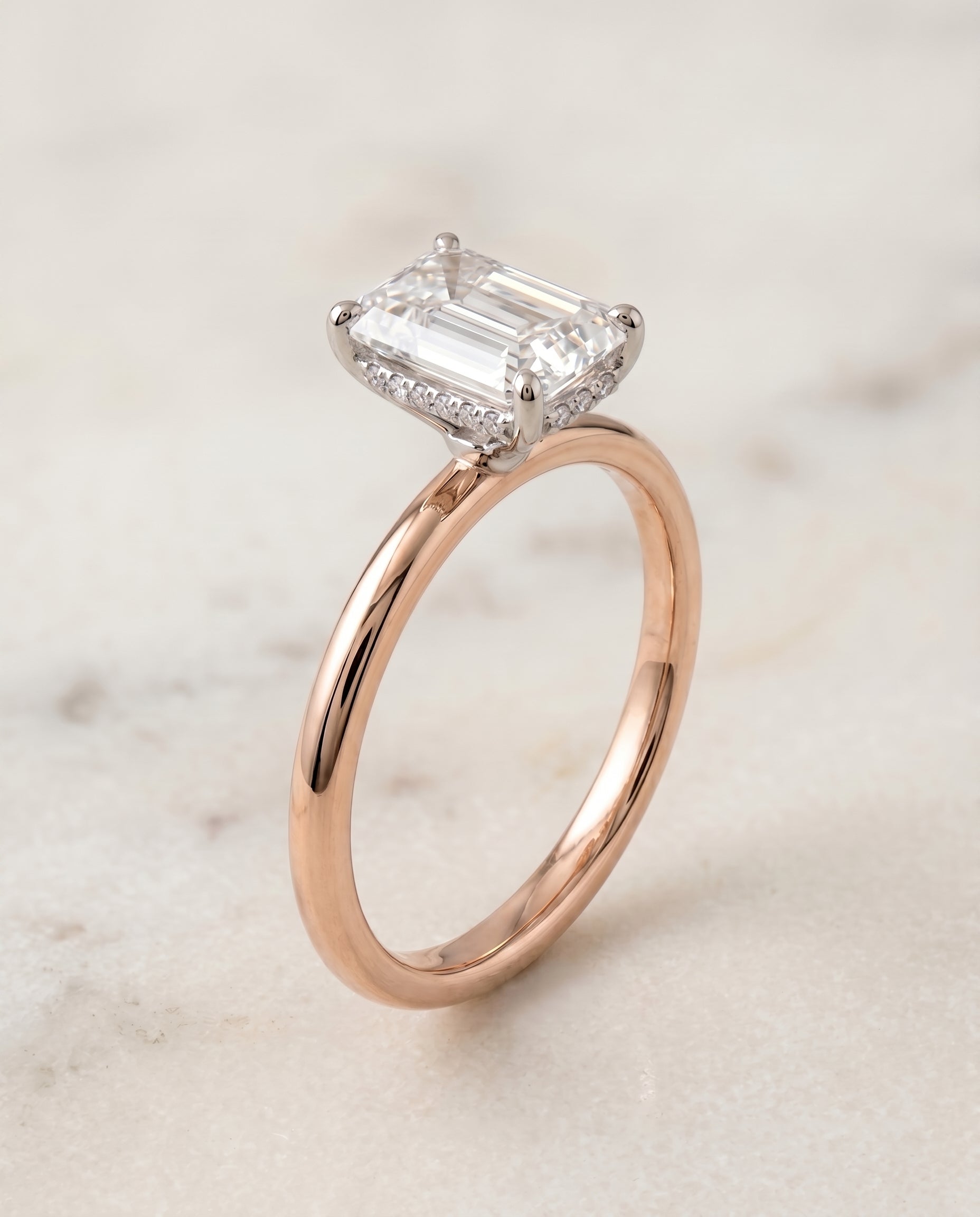 Upper Hidden Halo Solitaire Cut styling on The Eartha emerald engagement ring setting | RockHer