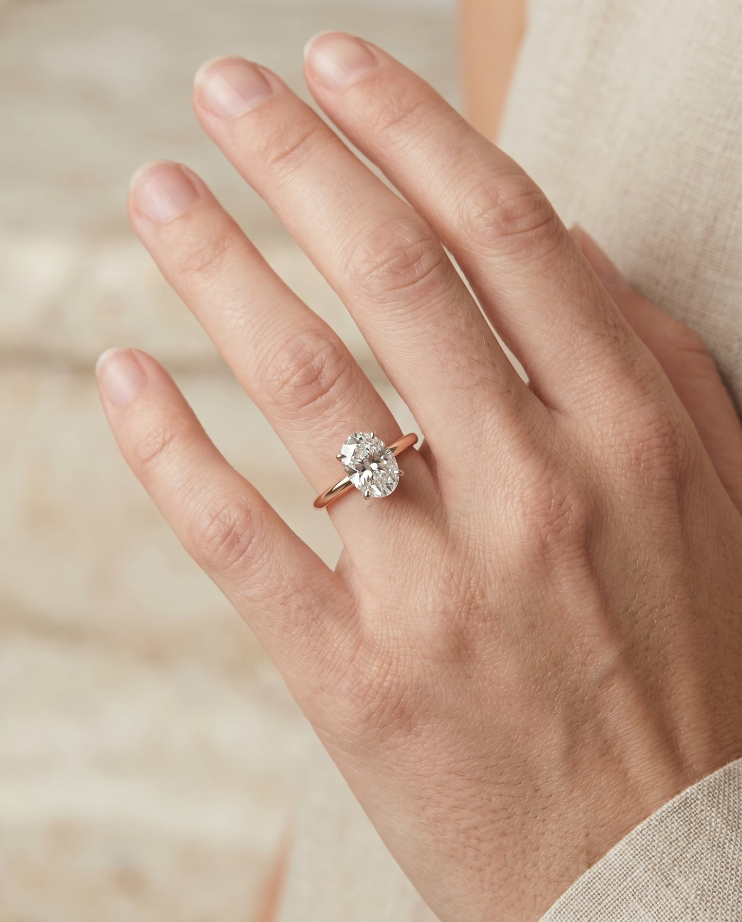 The Eartha Hidden Halo Engagement Ring Setting for Oval Diamonds in 14K Rose Gold