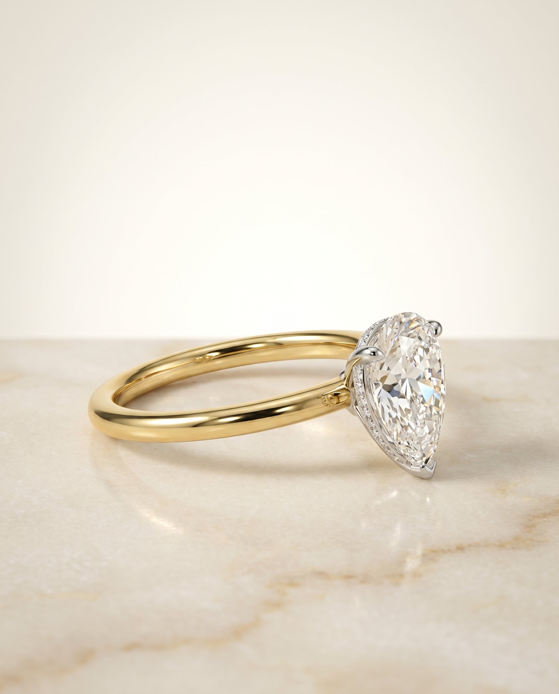 Upper Hidden Halo Solitaire styling on The Eartha princess engagement ring setting | RockHer