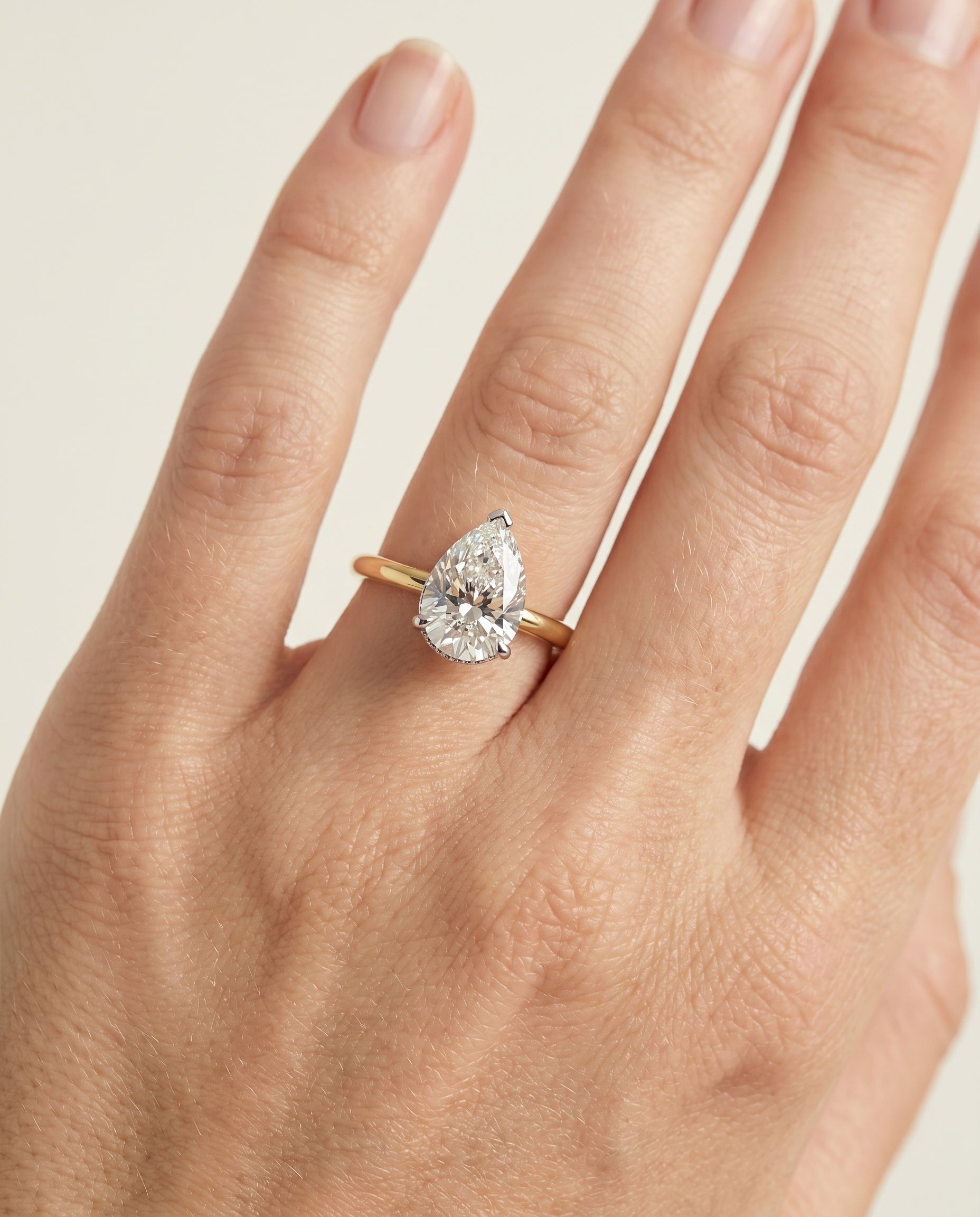 The Eartha engagement ring setting in 18K Yellow Gold, upper hidden halo solitaire design | RockHer