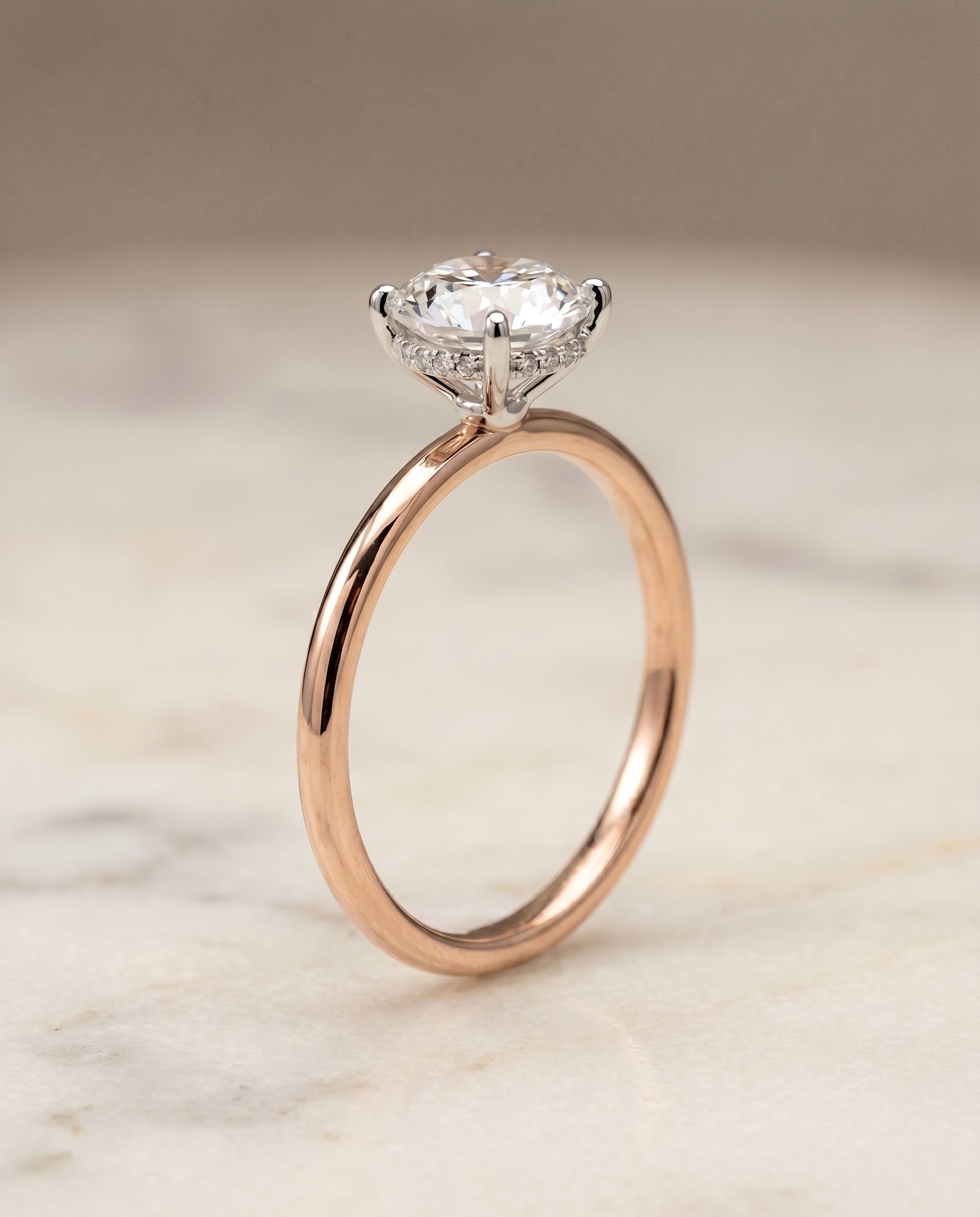 Upper Hidden Halo Solitaire styling on The Eartha round engagement ring setting | RockHer