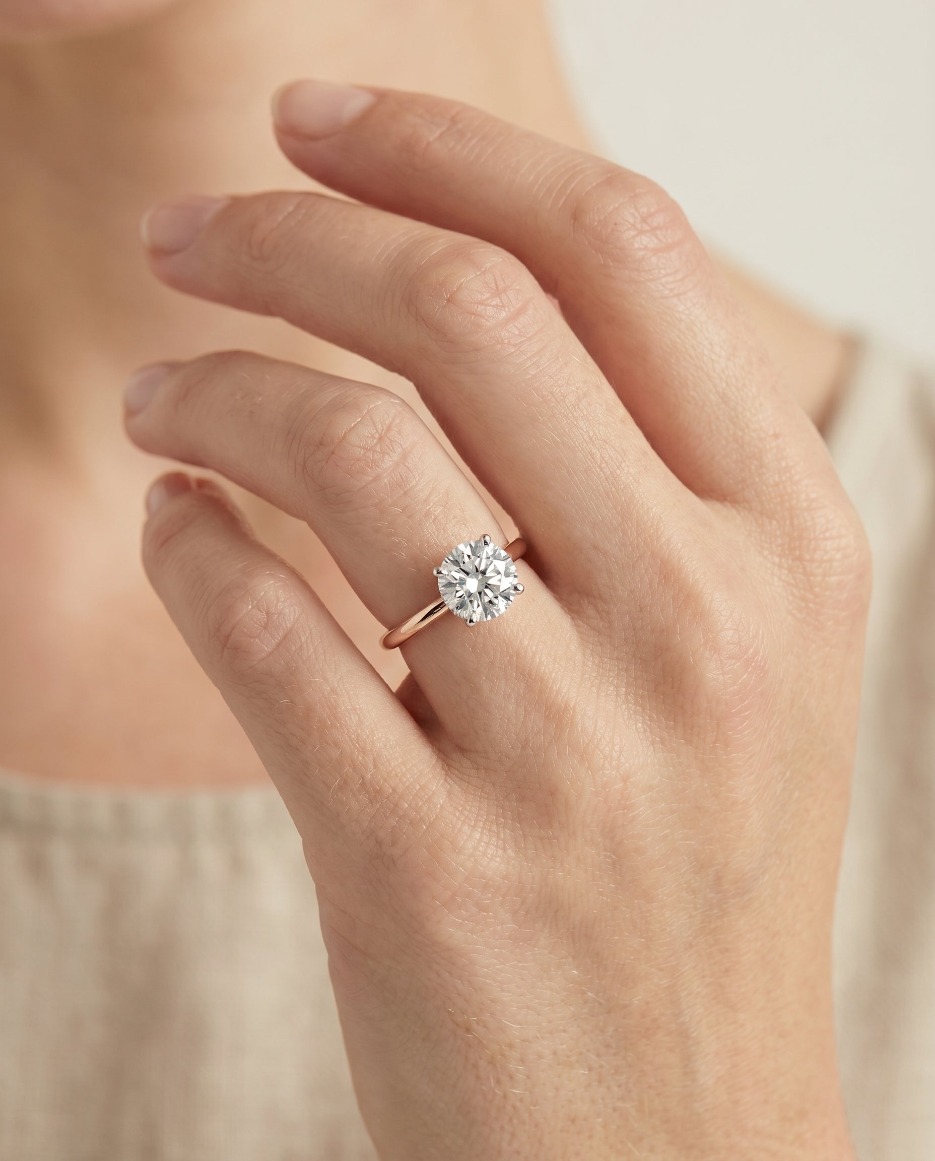The Eartha engagement ring setting in 14K Rose Gold, upper hidden halo solitaire design | RockHer