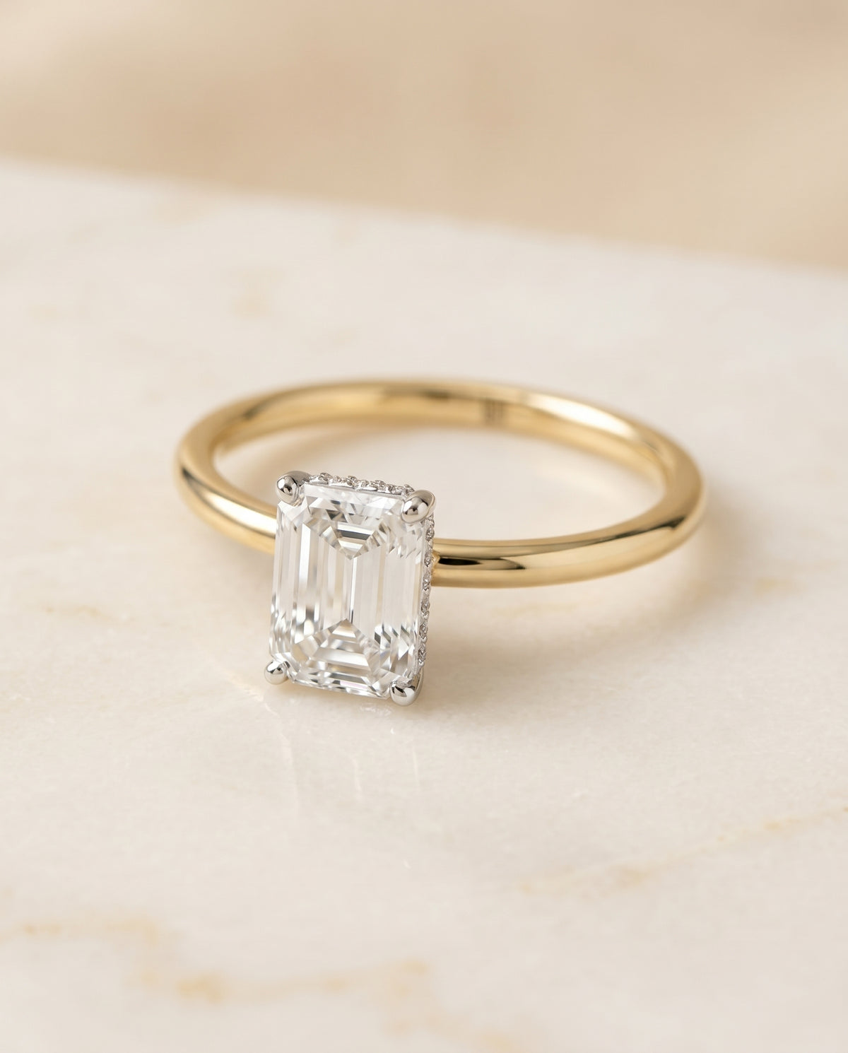 The Eartha Hidden Halo Solitaire Engagement Ring Setting for Emerald Cut Diamonds in 18K Yellow Gold | RockHer