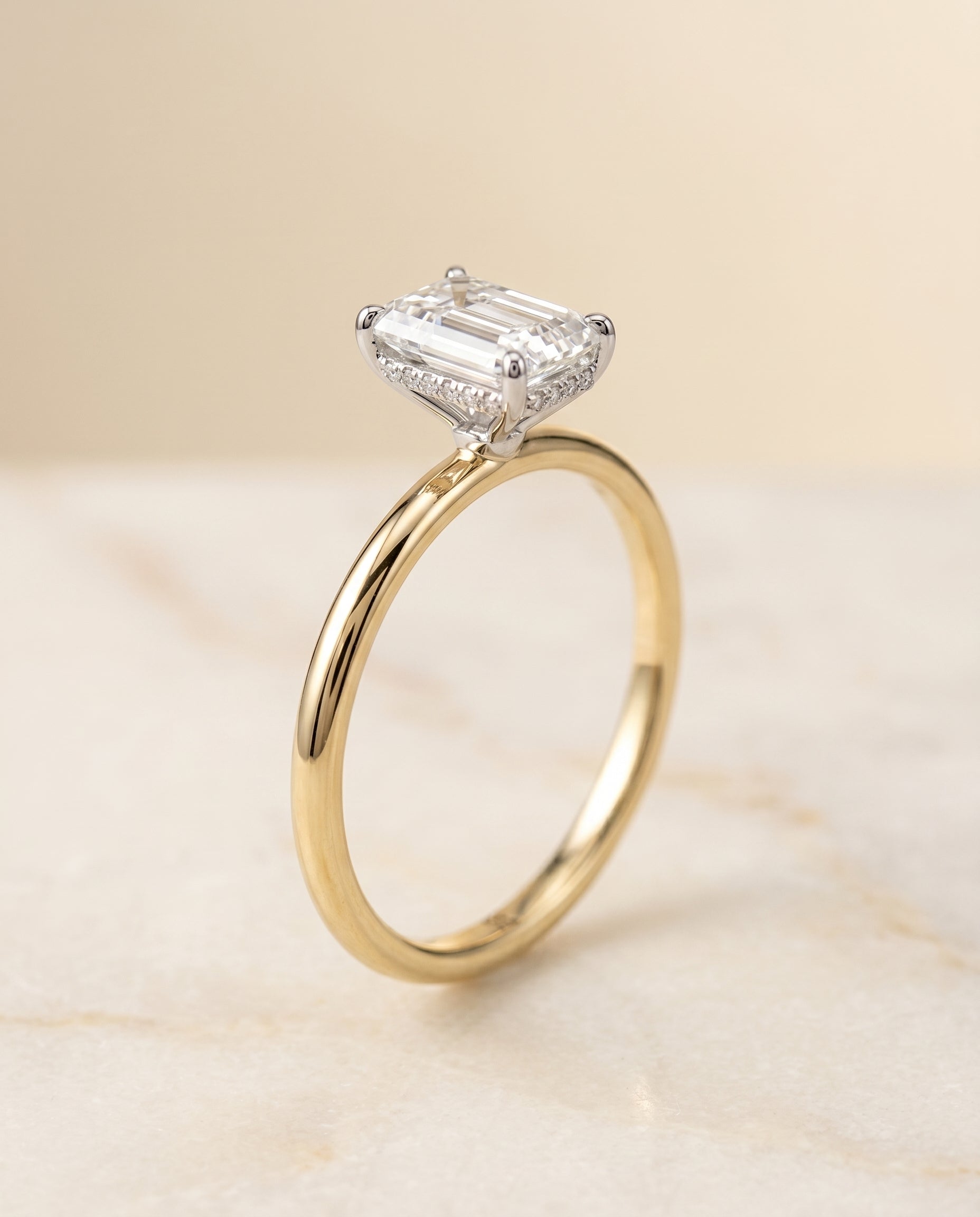 Upper Hidden Halo Solitaire Cut styling on The Eartha emerald engagement ring setting | RockHer