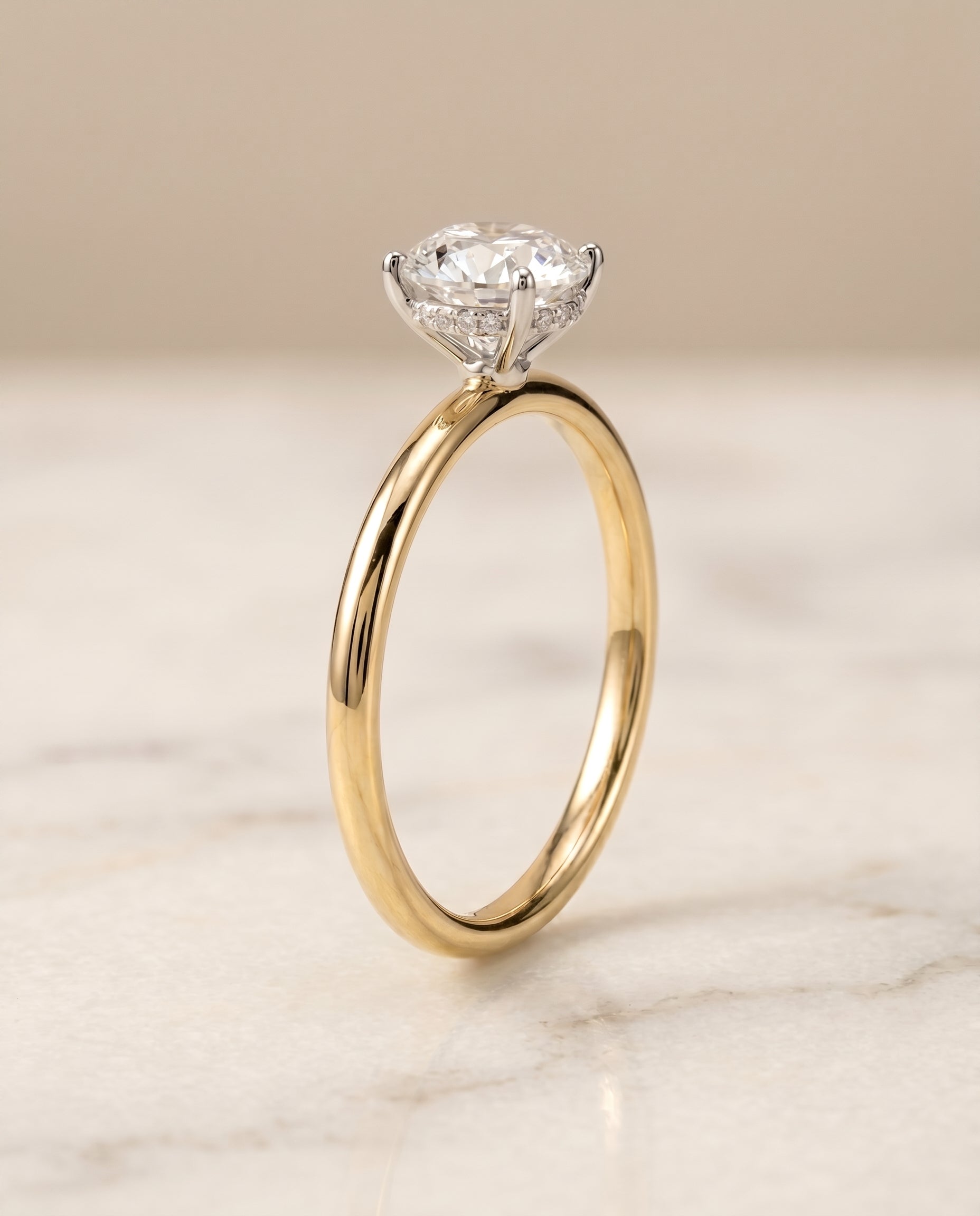 Upper Hidden Halo Solitaire styling on The Eartha round engagement ring setting | RockHer