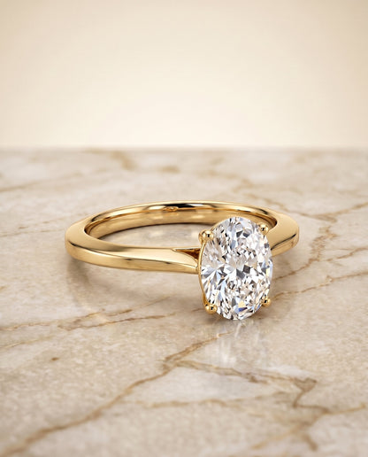 Elena Select Solitaire Oval Lab Diamond Engagement Ring in 18K Yellow Gold, shown on hand, angled | RockHer