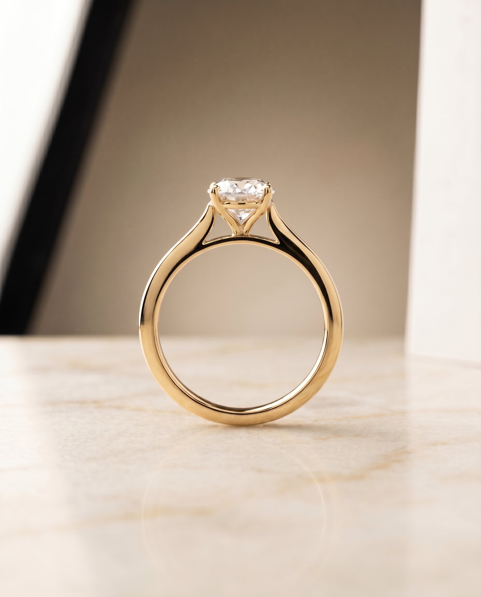 The Elena setting for oval diamonds, made to order in 18K Yellow Gold | RockHer