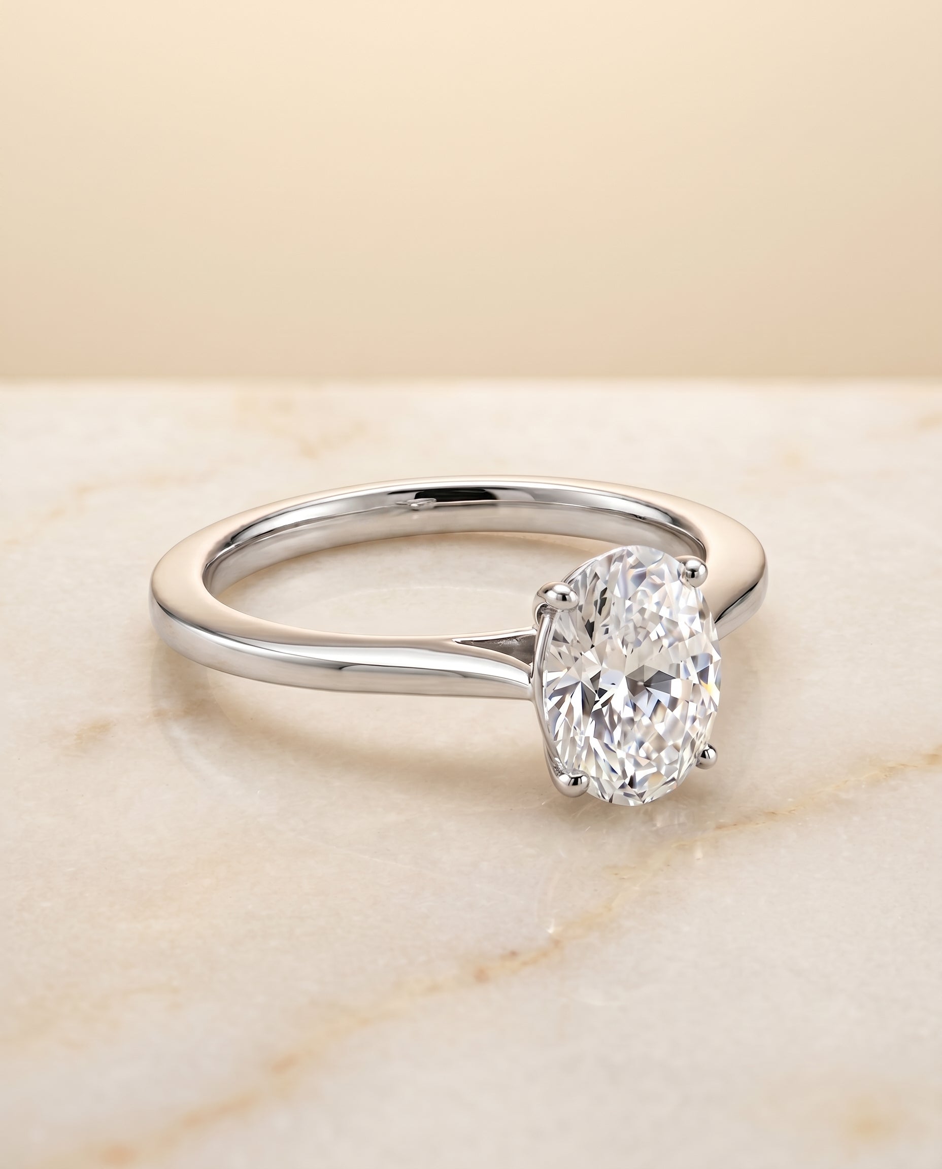 The Elena Solitaire Engagement Ring Setting for Oval Diamonds in Platinum