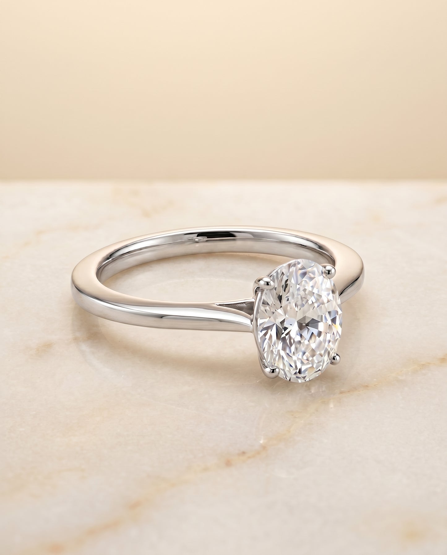 The Elena Solitaire Engagement Ring Setting for Oval Diamonds in Platinum