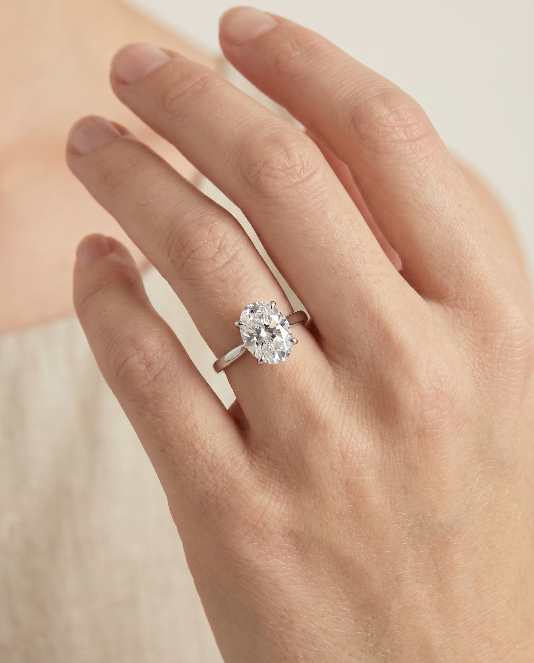 The Elena engagement ring setting in Platinum, timeless graduated beveled shank solitaire design | RockHer