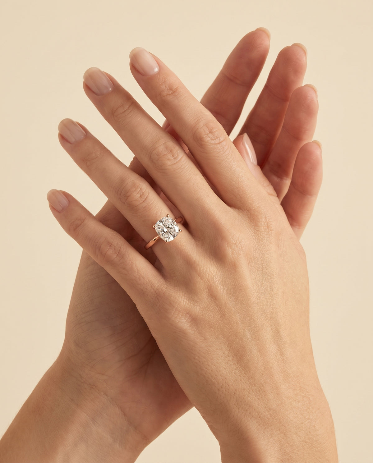 The Elena Timeless Graduated Beveled Shank Solitaire Cushion Cut Engagement Ring Setting in 14K Rose Gold