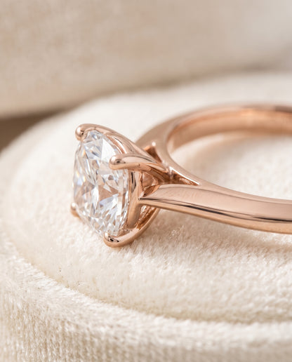 The Elena Timeless Graduated Beveled Shank Solitaire Cushion Cut Engagement Ring Setting in 14K Rose Gold