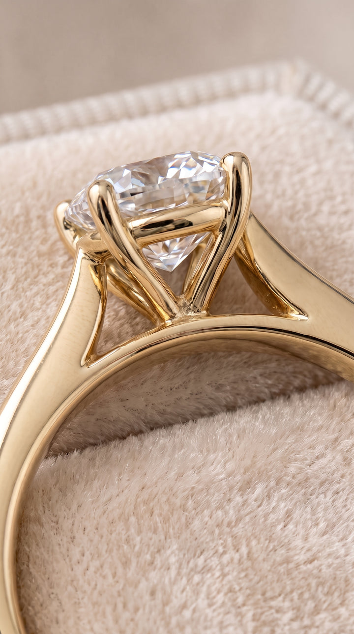 The Elena Timeless Graduated Beveled Shank Solitaire Cushion Cut Engagement Ring Setting in 18K Yellow Gold