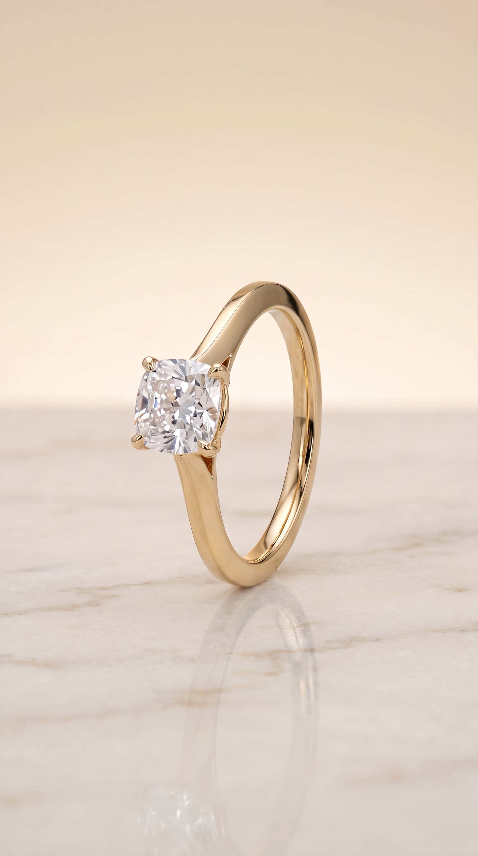 Timeless Graduated Beveled Shank Solitaire Cut styling on The Elena cushion engagement ring setting | RockHer