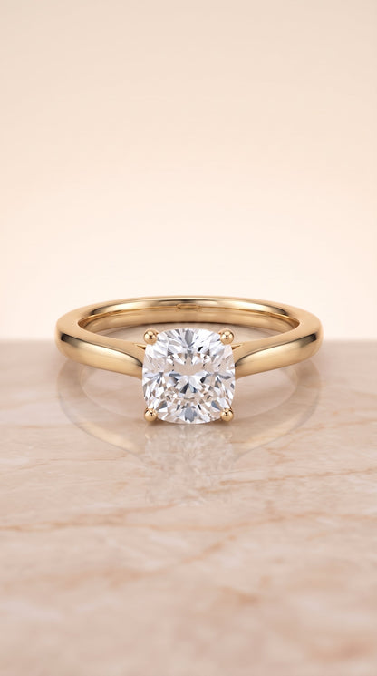 Elena Select Solitaire Cushion Cut Lab Diamond Engagement Ring in 18K Yellow Gold, shown on hand, angled | RockHer