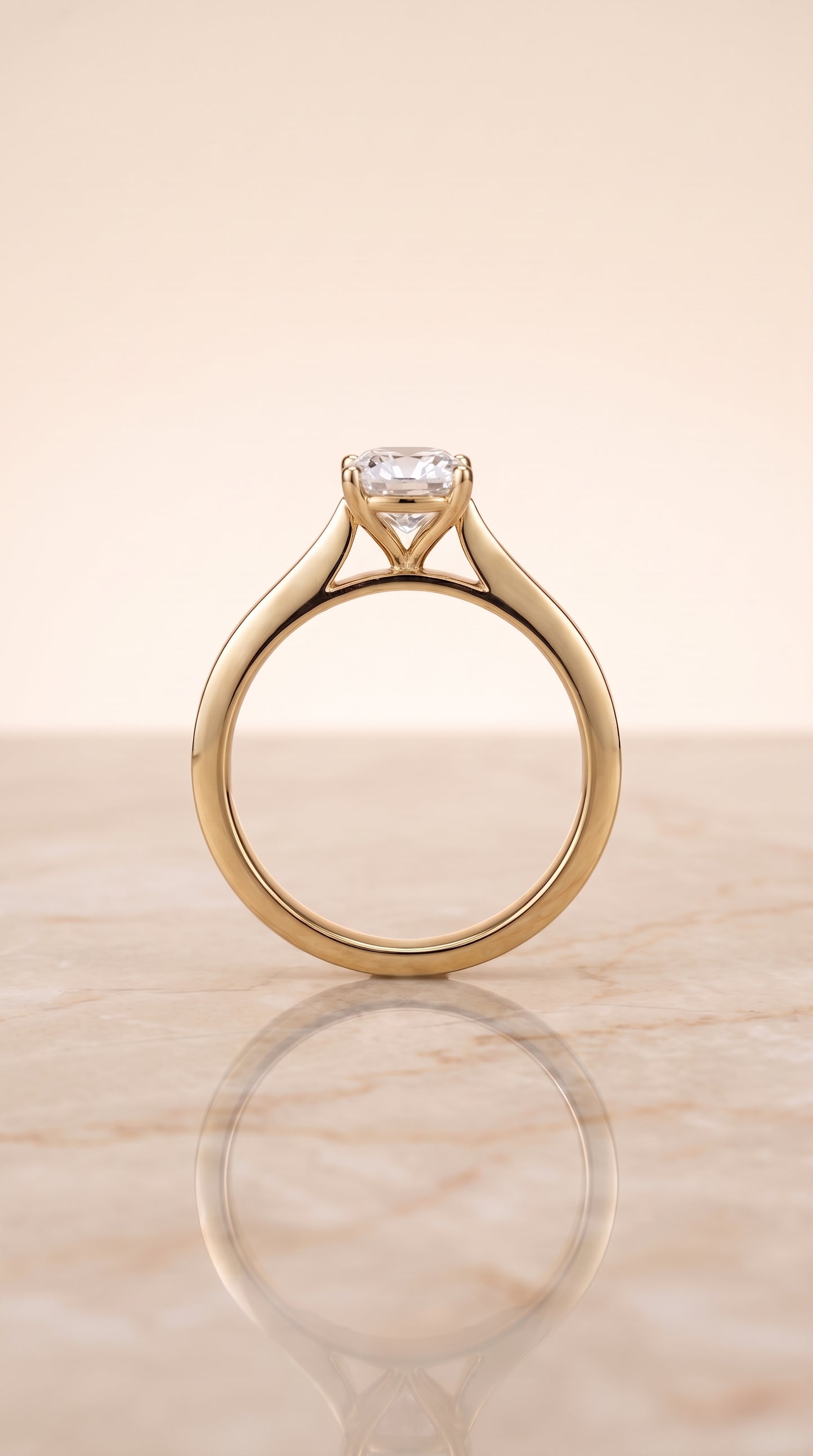 The Elena Timeless Graduated Beveled Shank Solitaire Cushion Cut Engagement Ring Setting in 18K Yellow Gold